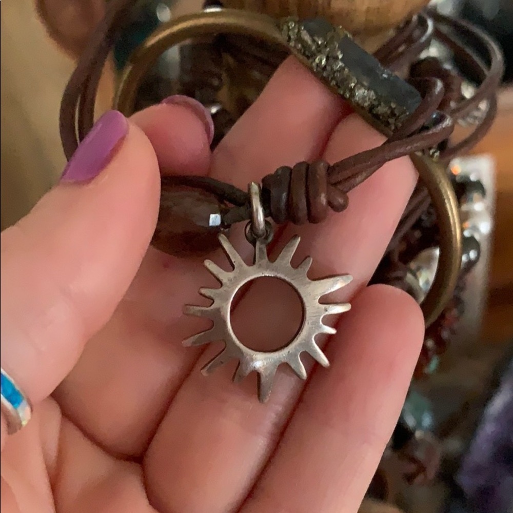 Poor Cat Designs sun burst charm.